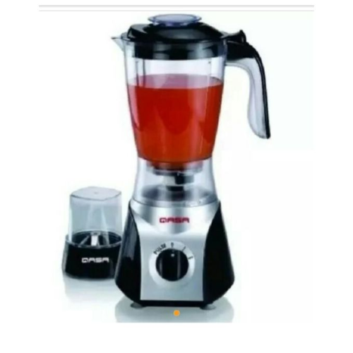 Woman blending smoothie using Qasa blender in Nigerian kitchen